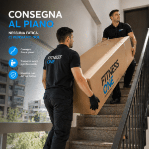 Consegna al piano | Due addetti di Fitness One salgono le scale con un grande pacco, evidenziando i Servizi di trasporto.